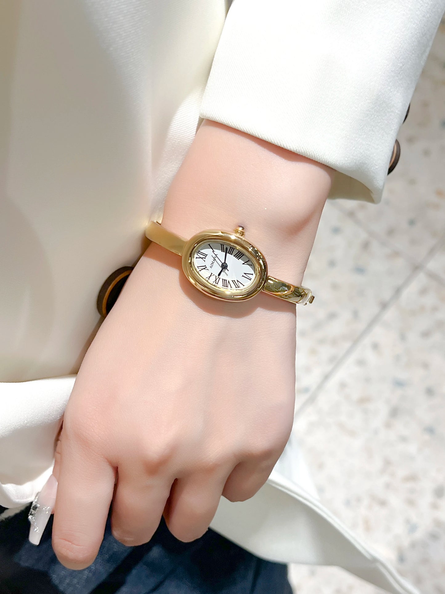 Gold Oval Women’s Watch – Roman Numeral Dial