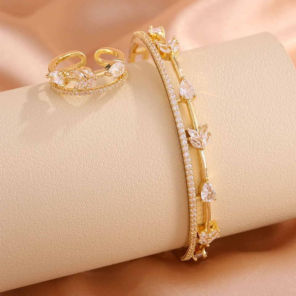 ZAKOL Women Fashion CZ Flower Leaf Open Cuff Bracelet Ring Set Cubic Zirconia Adjustable Bangle Ring Wedding Party Jewelry Set