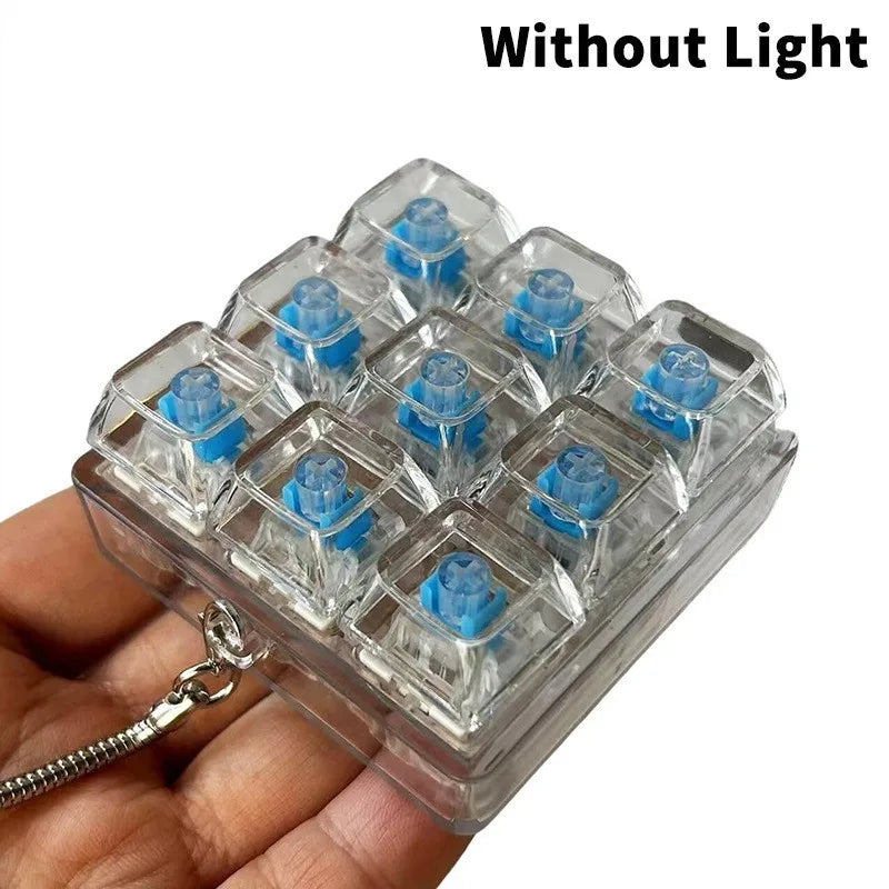 زَكول لوحة مفاتيح ألعاب فِيدجيت LED غطاء مفتاح كريستالي سلسلة مفاتيح تخفيف التوتر أداة للأصابع ألعاب تفريغ الضغط لعبة فِيدجيت نقّارة