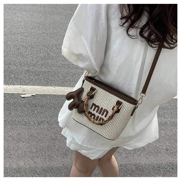 2025 New Spring Fashion Contrasting Straw Bamboo Joints Basket Bag Bucket Bag Hand-held Shoulder Diagonal Bag
