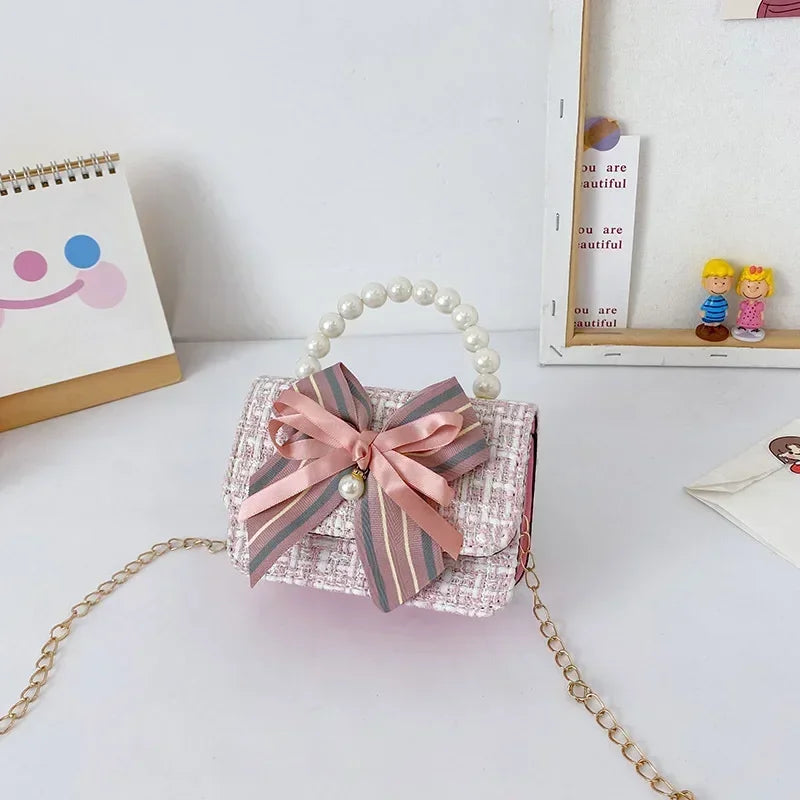 Princess Chanel style chain bag baby pearl accessories hand bell bag trendy children cute bow girl shoulder bag