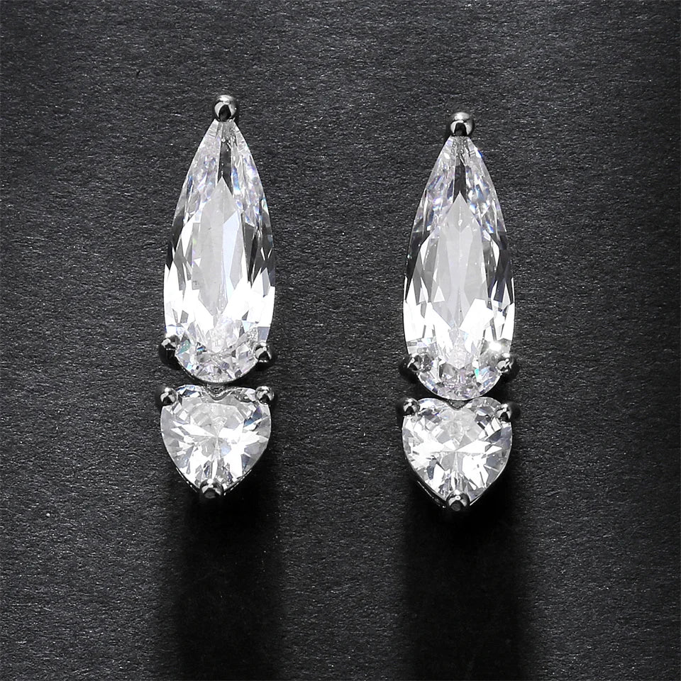 ZAKOL Pear Cut Solitaire White Zircon Mini Stud Earrings Exquisite Crystal Water Drop CZ Earring Jewelry Gift for Women Girls