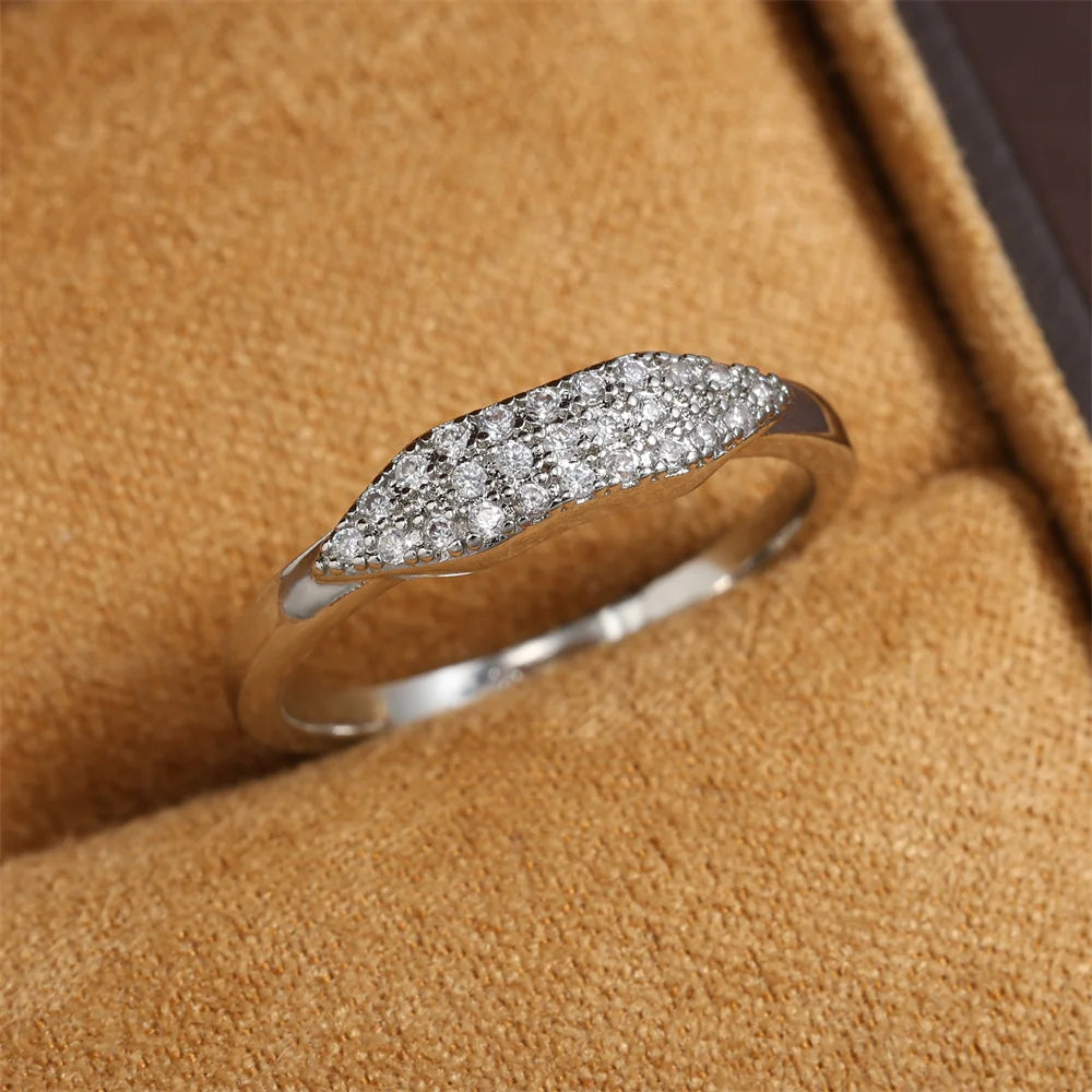 ZAKOL New Trendy Shiny Micro Pave Zircon Finger Ring White  Crystal CZ Minimalist Aesthetic Ring for Women Wholesale