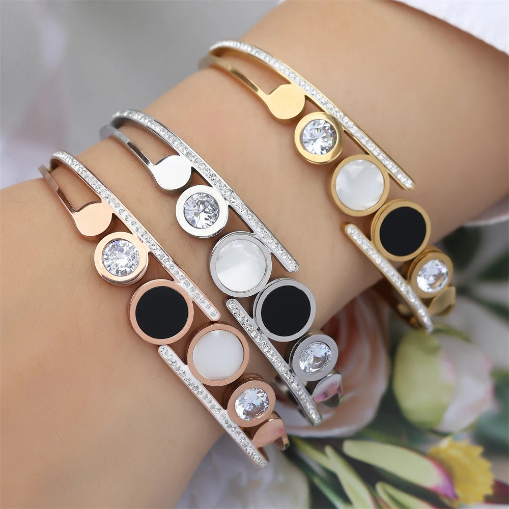 ZAKOL Fashion Black Shell Roman Numeral Titanium Steel Bangle Hollow Circle Button Bracelet Jewelry Gifts for Women