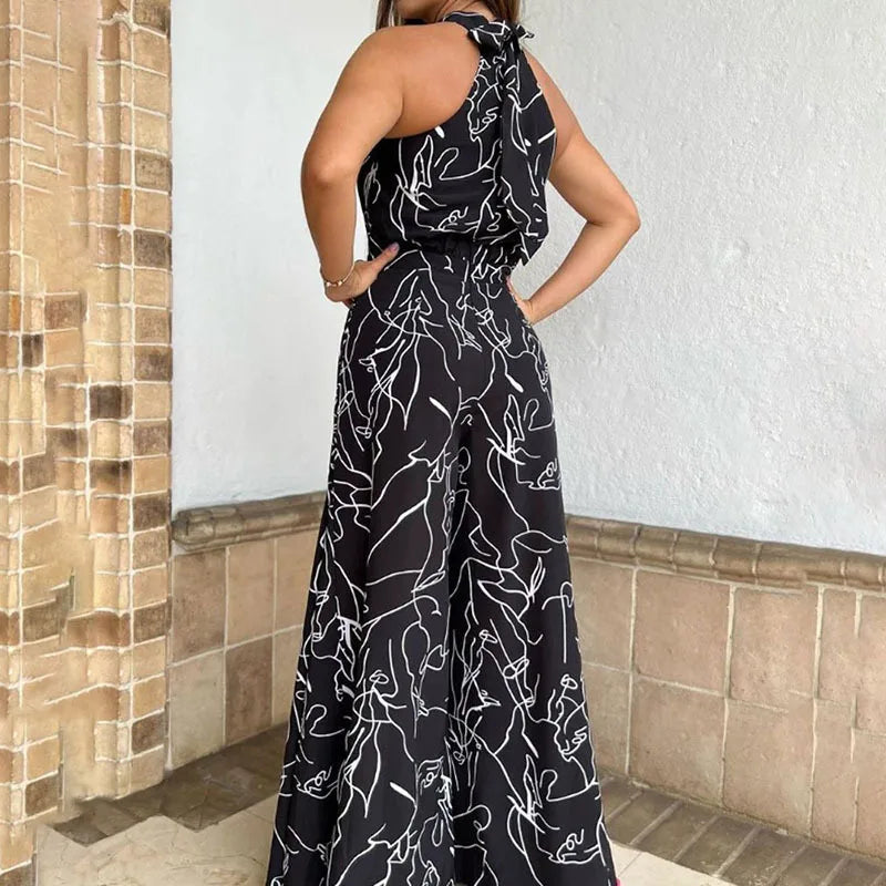 Summer Lace-Up Sleeveless Jumpsuit – Loose Fit with Geometric Print & Pockets | جمبسوت صيفي أنيق بدون أكمام برباط خصر ونقشة هندسية مع جيوب