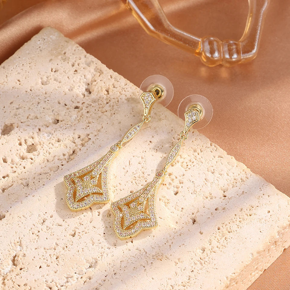 أقراط زاكول المتدلية الجديدة بلون ذهبي لامع للغاية مرصعة بالزيركون للنساء، مرصعة بأحجار كوبالتيا الزرقاء اللامعة، مجوهرات فاخرة لحفلات الزفاف والأعراس