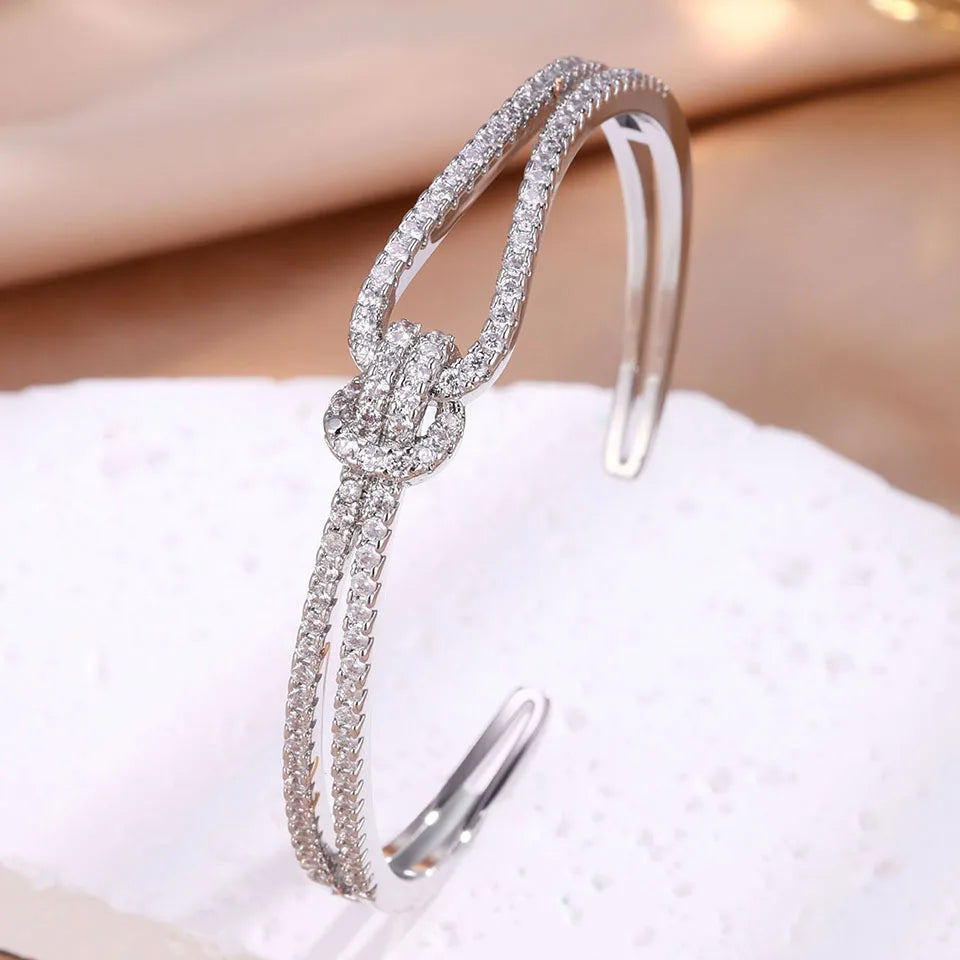 ZAKOL Exquisite Dazzling Full Cubic Zirconia Knot Bracelet Bangles for Women Fashion Adjustable Open Bracelet Jewelry Gift