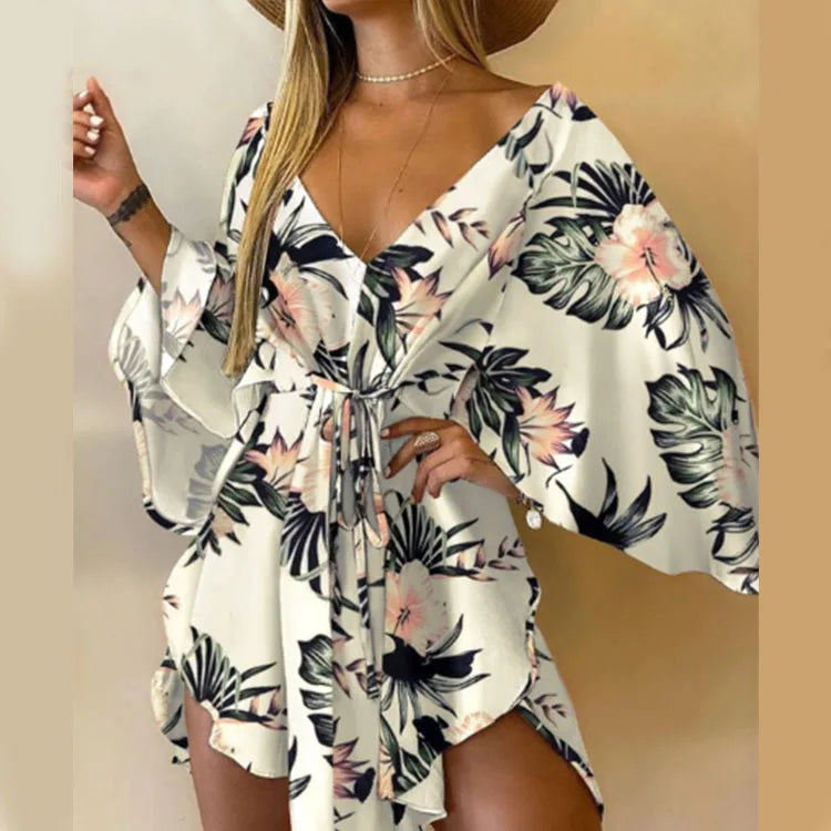 Sexy V-Neck Floral Boho Dress – Asymmetrical Loose Fit with Batwing Sleeves | فستان بوهيمي صيفي واسع بنقشة أوراق وياقة V وأكمام بات وينغ غير متماثل