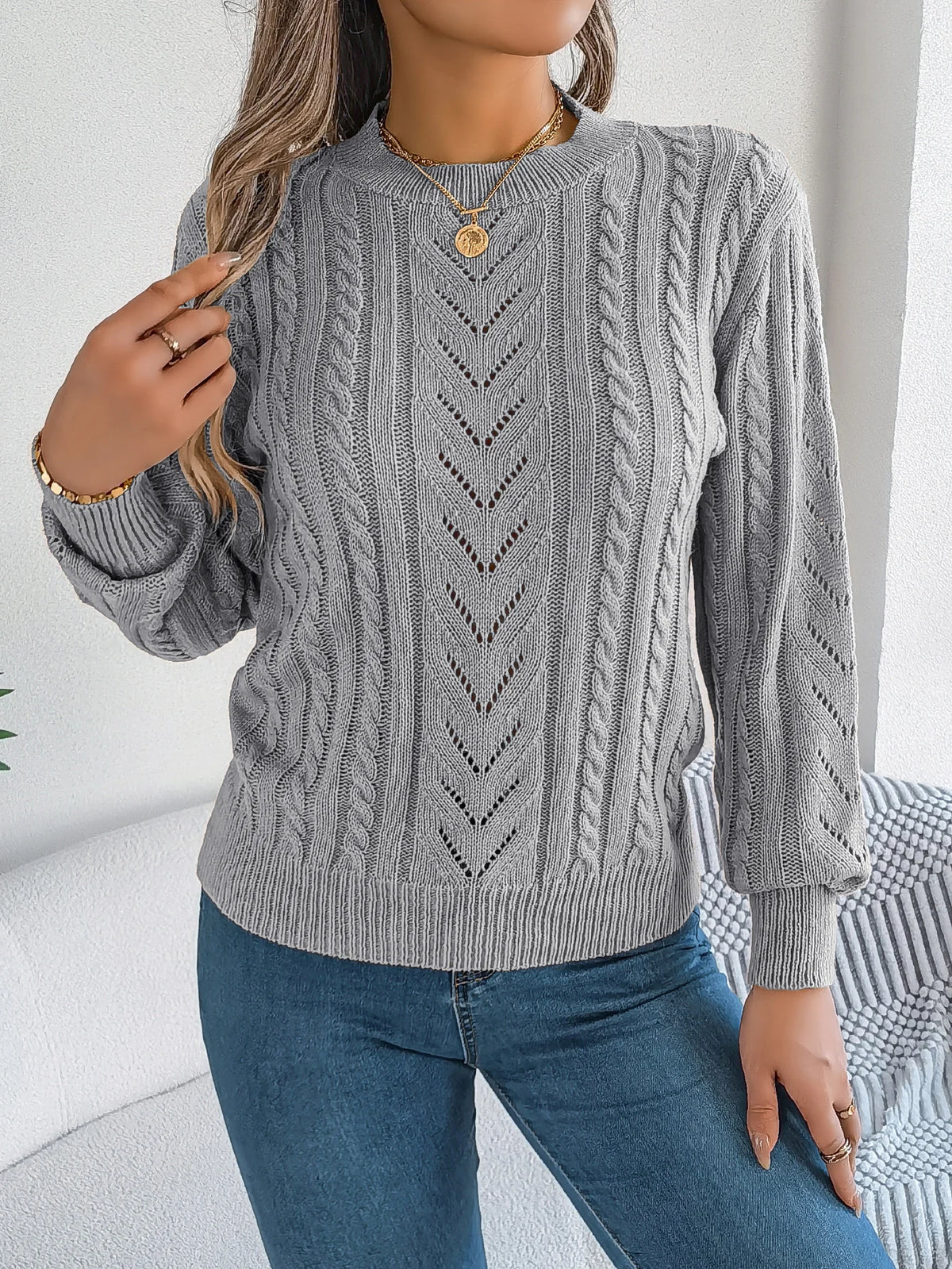 Autumn and Winter Casual Solid Color O-Neck Hollow Out Long Sleeved Pullover Sweater