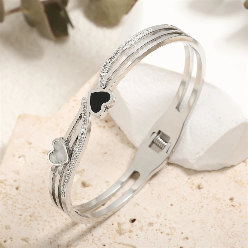 ZAKOL Fashion Black Shell Roman Numeral Titanium Steel Bangle Hollow Circle Button Bracelet Jewelry Gifts for Women
