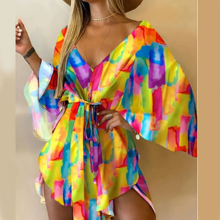 Sexy V-Neck Floral Boho Dress – Asymmetrical Loose Fit with Batwing Sleeves | فستان بوهيمي صيفي واسع بنقشة أوراق وياقة V وأكمام بات وينغ غير متماثل