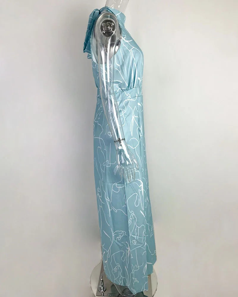 Summer Lace-Up Sleeveless Jumpsuit – Loose Fit with Geometric Print & Pockets | جمبسوت صيفي أنيق بدون أكمام برباط خصر ونقشة هندسية مع جيوب