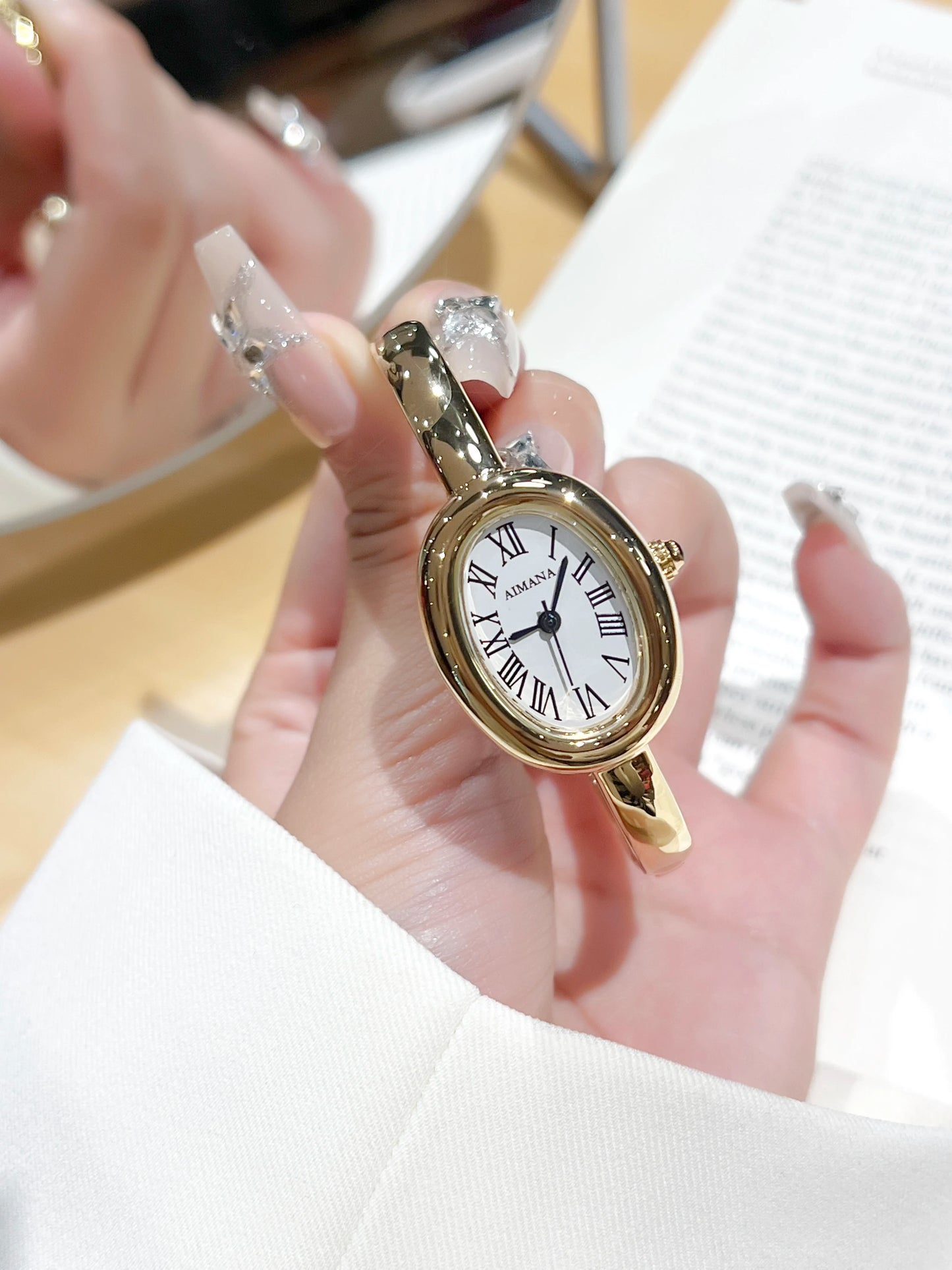 Gold Oval Women’s Watch – Roman Numeral Dial