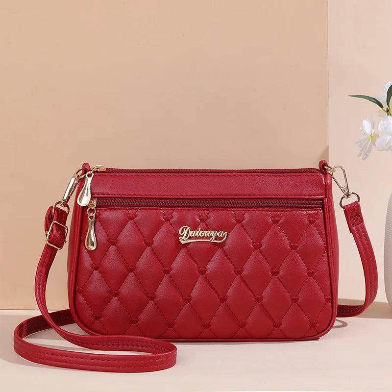 👜 Embroidery Messenger Bags Women Leather Handbags - حقيبة كتف نسائية مطرزة جلدية مع كُرة زينة أنيقة