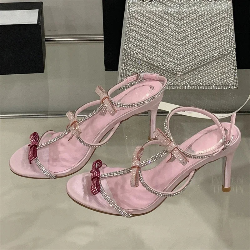 Aneikeh Women’s Crystal Butterfly Knot High Heels – Sexy Peep-Toe Ankle Strap Stiletto Sandals for Banquets & Parties | صندل أنيق من Aneikeh بكعب رفيع ورباط كاحل – تصميم مفتوح مع فيونكة كريستال لحفلات السهرة والمناسبات
