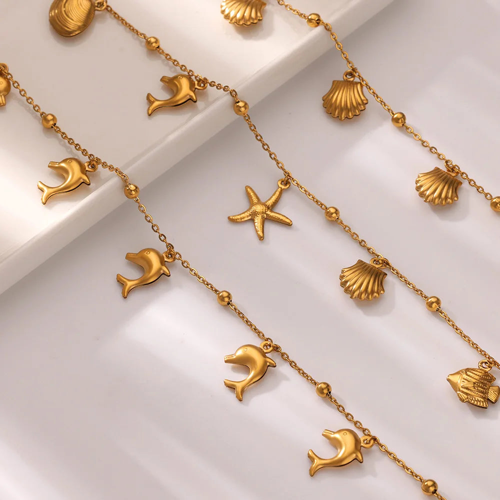 ✨ Ocean Animal Anklet – Gold Stainless Steel Beach Foot Jewelry 🔷 خلخال بسلسلة حيوانات البحر – ستانلس ستيل ذهبي لإطلالة صيفية أنيقة للنساء