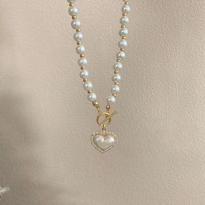 ✨ Elegant Pearl Heart Pendant Necklace – Korean Style Luxury Chain 🔷 عقد أنيق بلؤلؤ صناعي مع تعليقة قلب – تصميم فاخر كوري للنساء والبنات
