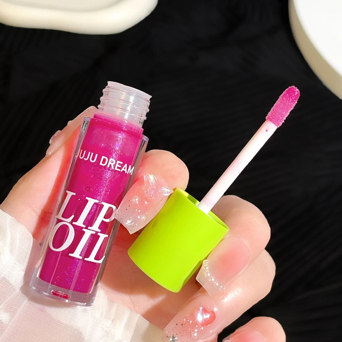Mirror Shine Water Gloss – Long-Lasting, Moisturizing Transparent Lip Plumper | قلوس شفاه لامع بتأثير الزجاج – مرطّب، يدوم طويلًا، شفاف ويمنح الشفاه امتلاء طبيعي