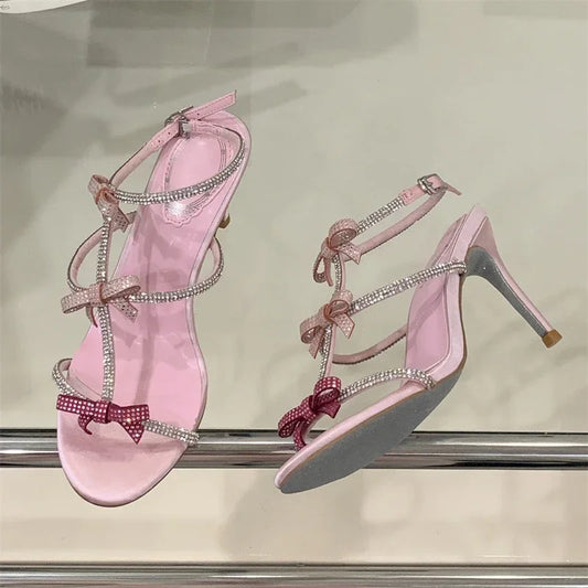 Aneikeh Women’s Crystal Butterfly Knot High Heels – Sexy Peep-Toe Ankle Strap Stiletto Sandals for Banquets & Parties | صندل أنيق من Aneikeh بكعب رفيع ورباط كاحل – تصميم مفتوح مع فيونكة كريستال لحفلات السهرة والمناسبات
