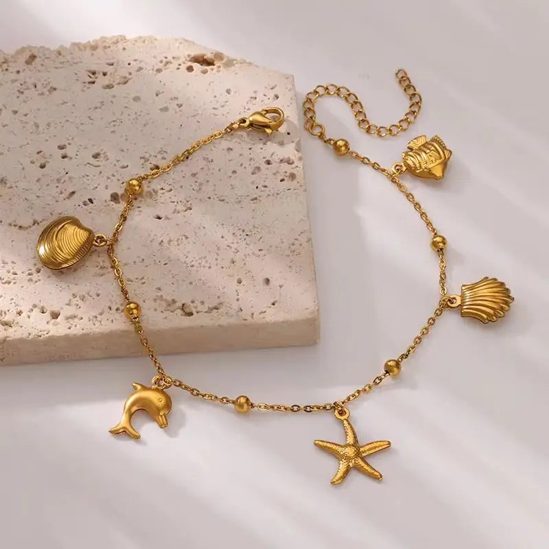 ✨ Ocean Animal Anklet – Gold Stainless Steel Beach Foot Jewelry 🔷 خلخال بسلسلة حيوانات البحر – ستانلس ستيل ذهبي لإطلالة صيفية أنيقة للنساء